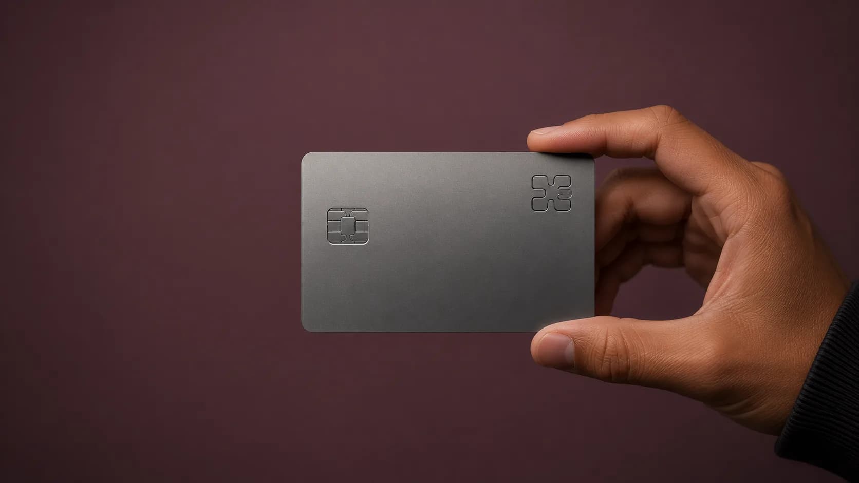 A hand holding the Starfin card